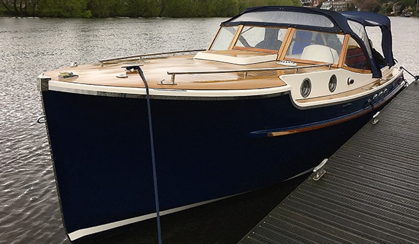 "Amie" arriving from Holland, hanging on for dear life and finally afloat and well on the river Dee.