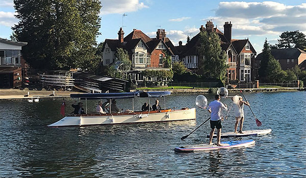 Paddling bride and groom at their Marlow wedding earlier this month.