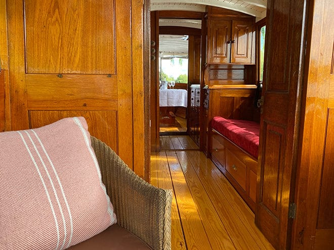 'Tarbes II's' beautiful varnished mahogany interior