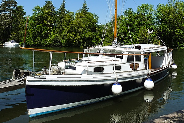 "Ferry Nymph" (above) when we got her and (below) after being lovingly restored.