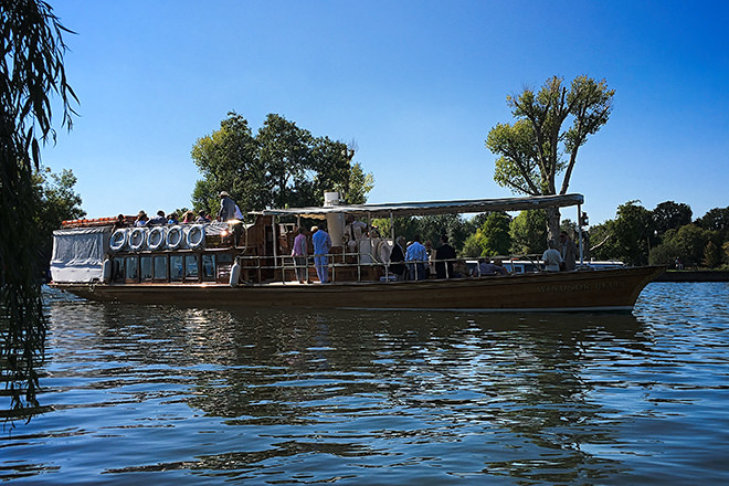 Cruising to collect our passengers for Henley Festival on board 'Windsor Belle'.