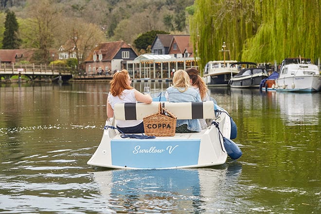 Girls enjoying their cruise with a Coppa picnic on board.