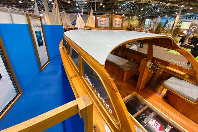 A vintage wooden boat fit with a Fisher Panda electric propulsion system at BOOT, Dusseldorf.