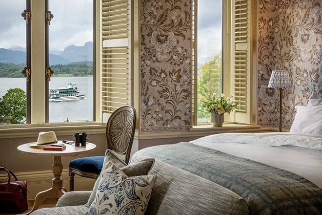 One of their comfortable, thoughtfully designed guest rooms with a view on the lake