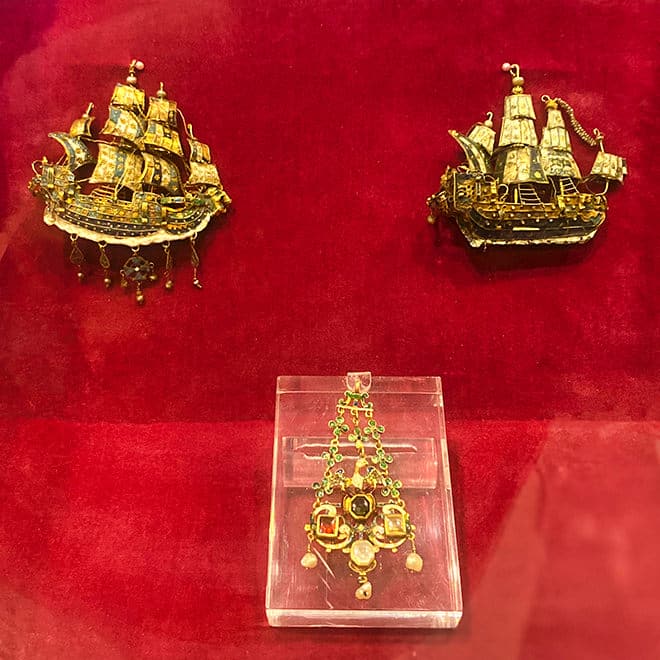 Gold pendants in the shape of caravels, owned by the wives of Patmian shipowners, decorated with polychrome enamel and pearls. (Patmos - 17th century)