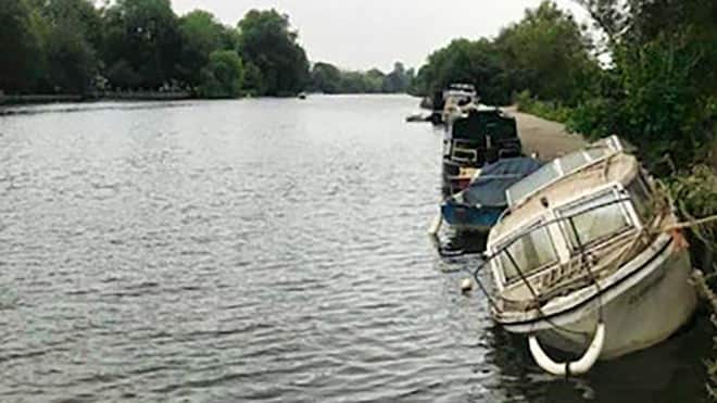 One of the many abandoned boats along the River Thames.