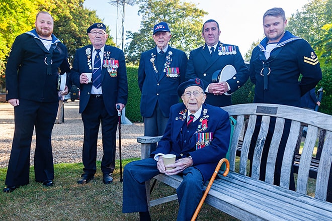 Honouring service across the generations.
Veterans and serving naval personnel gathered in camaraderie.